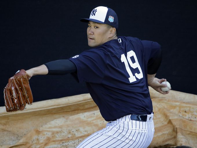 New York Yankees Pitcher Masahiro Tanaka Of Japan Fist Bumps A