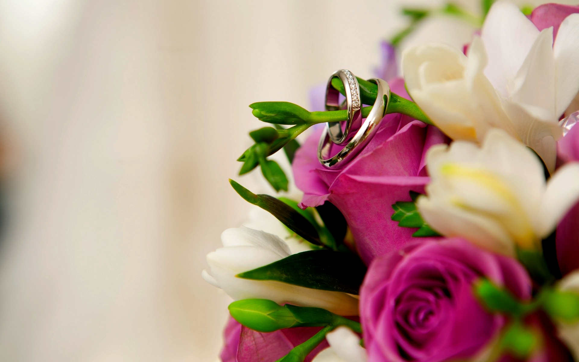 Wedding Rings On Flowers Bouquet High Quality Wallpaper