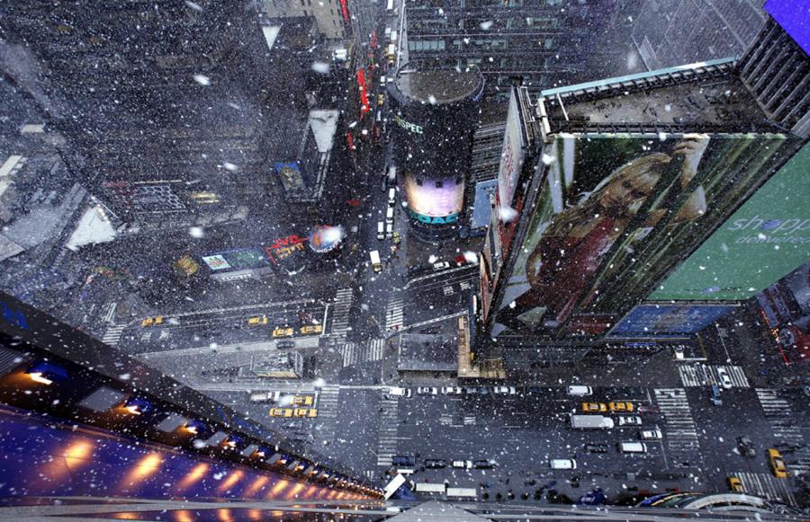 Snow Falls On Times Square During A Spring Storm In New York City
