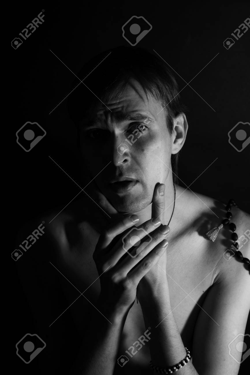 Young Slender Naked Man On A Black Background Stock Photo Picture