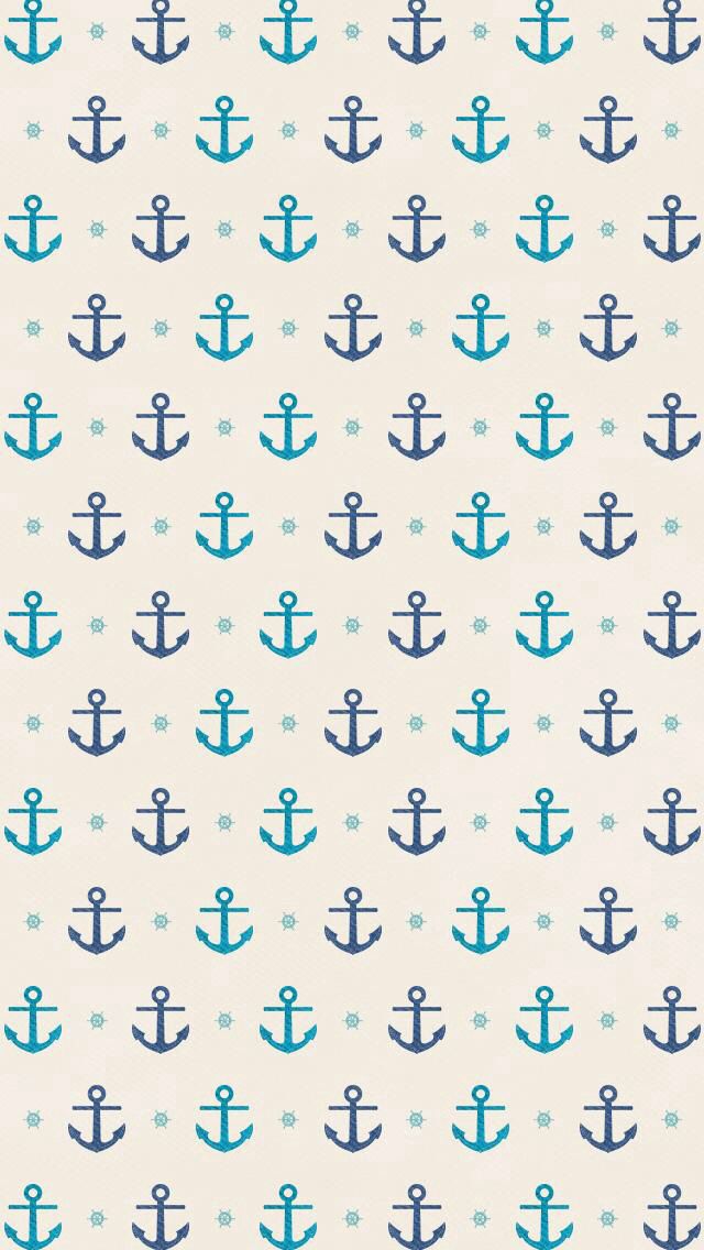 Small Teal And Navy Blue Anchor Anchors On Off White Background