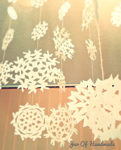 Free Download Jar Of Handmade Diy Paper Snowflakes Hanging From