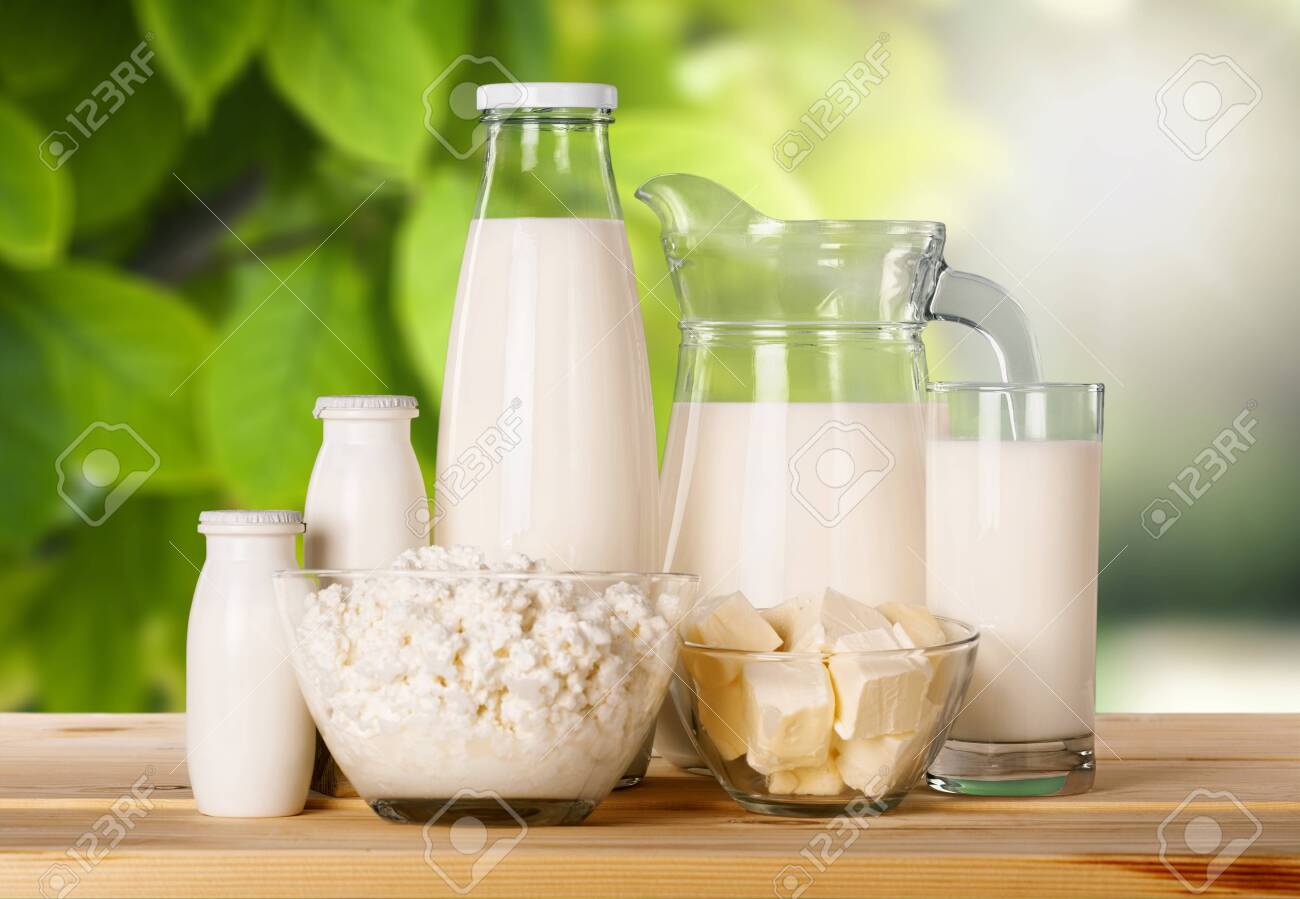 Glass Of Milk And Dairy Products On Background Stock Photo