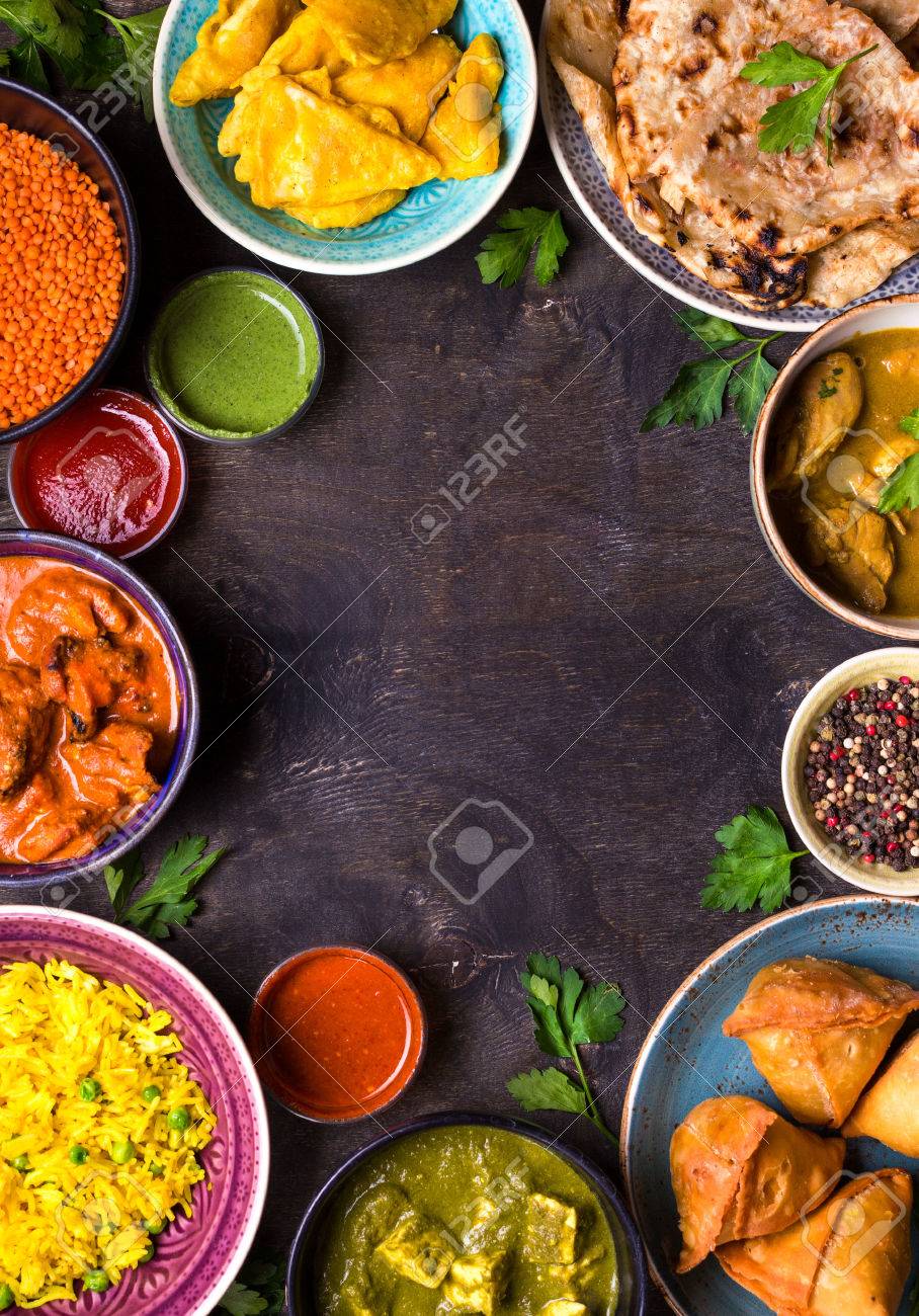 Assorted Indian Food On Dark Wooden Background Dishes Of