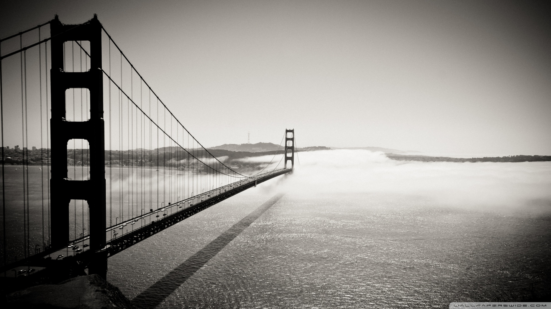 Black and White Photo of Golden Gate Bridge in Fog