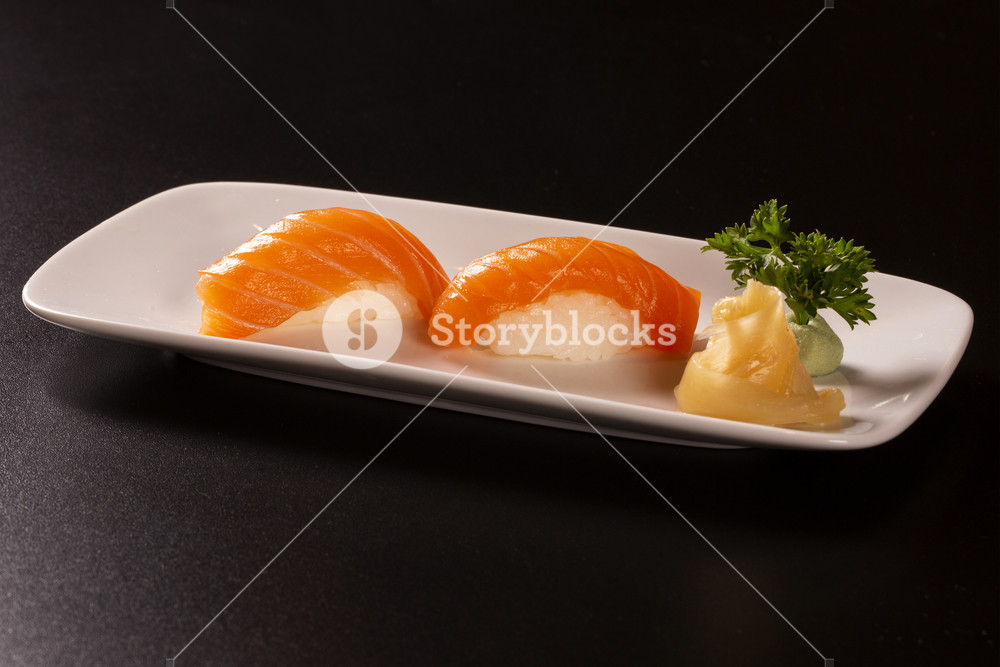 Sake Nigiri Sushi With Raw Salmon On Black Background Royalty