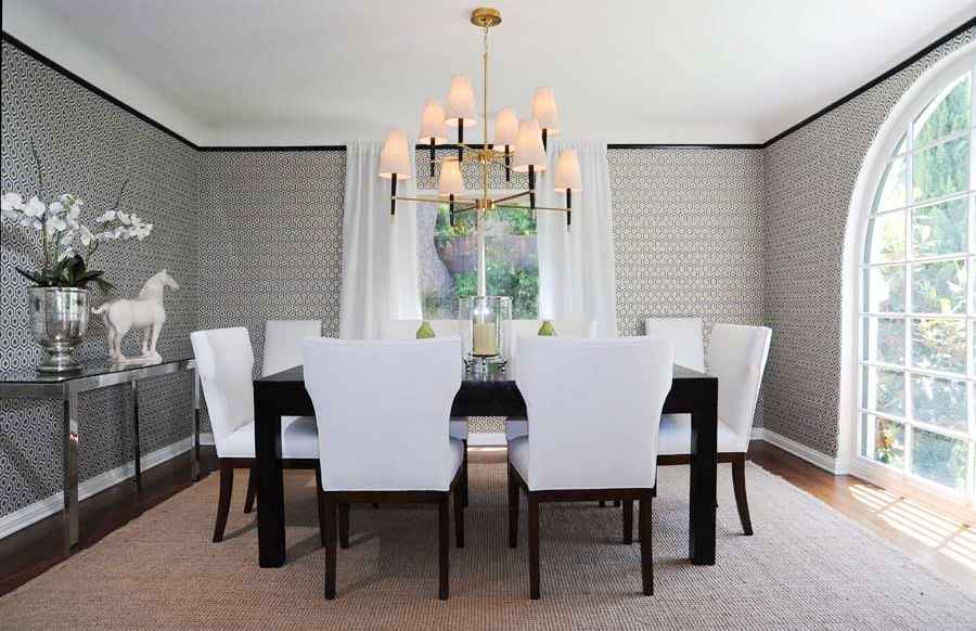Dining Room With Graphic Wallpaper Black Crown Molding A Table