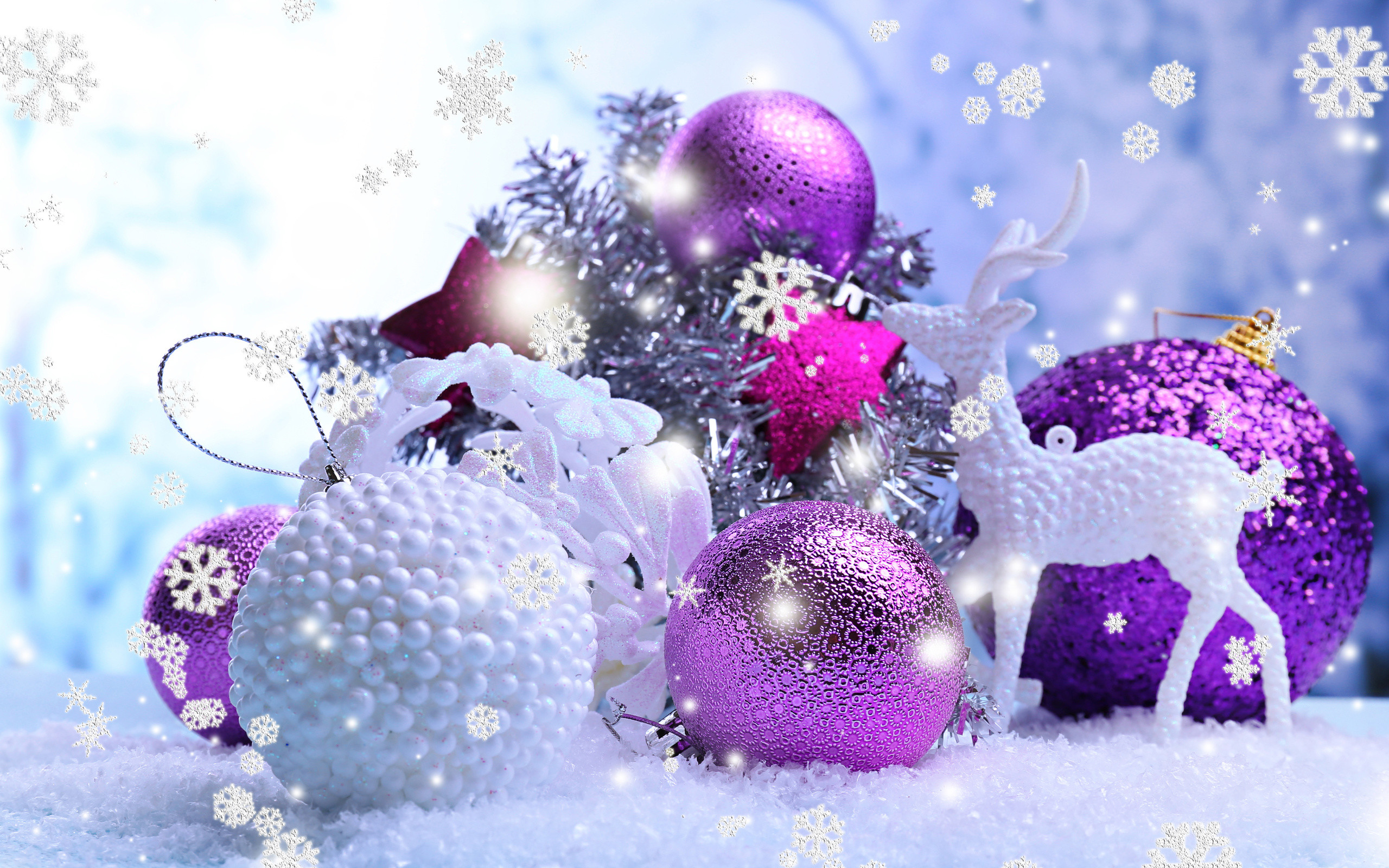 Purple and white Christmas ornaments with decorative stars, tinsel, a white reindeer figurine, and snowflake graphics on a snowy background