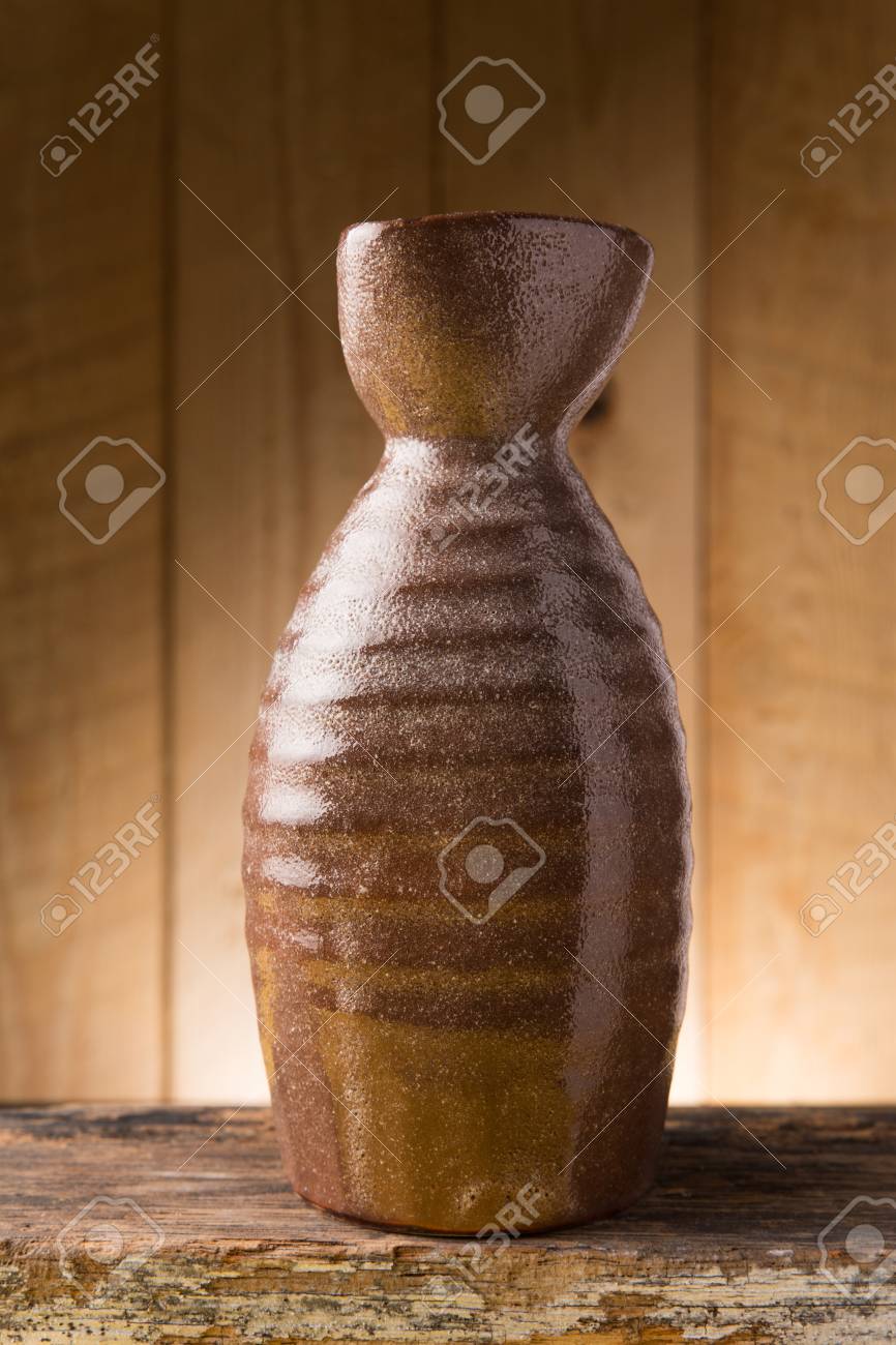 Japanese Sake Drinking Set On Wood Texture Background Stock Photo