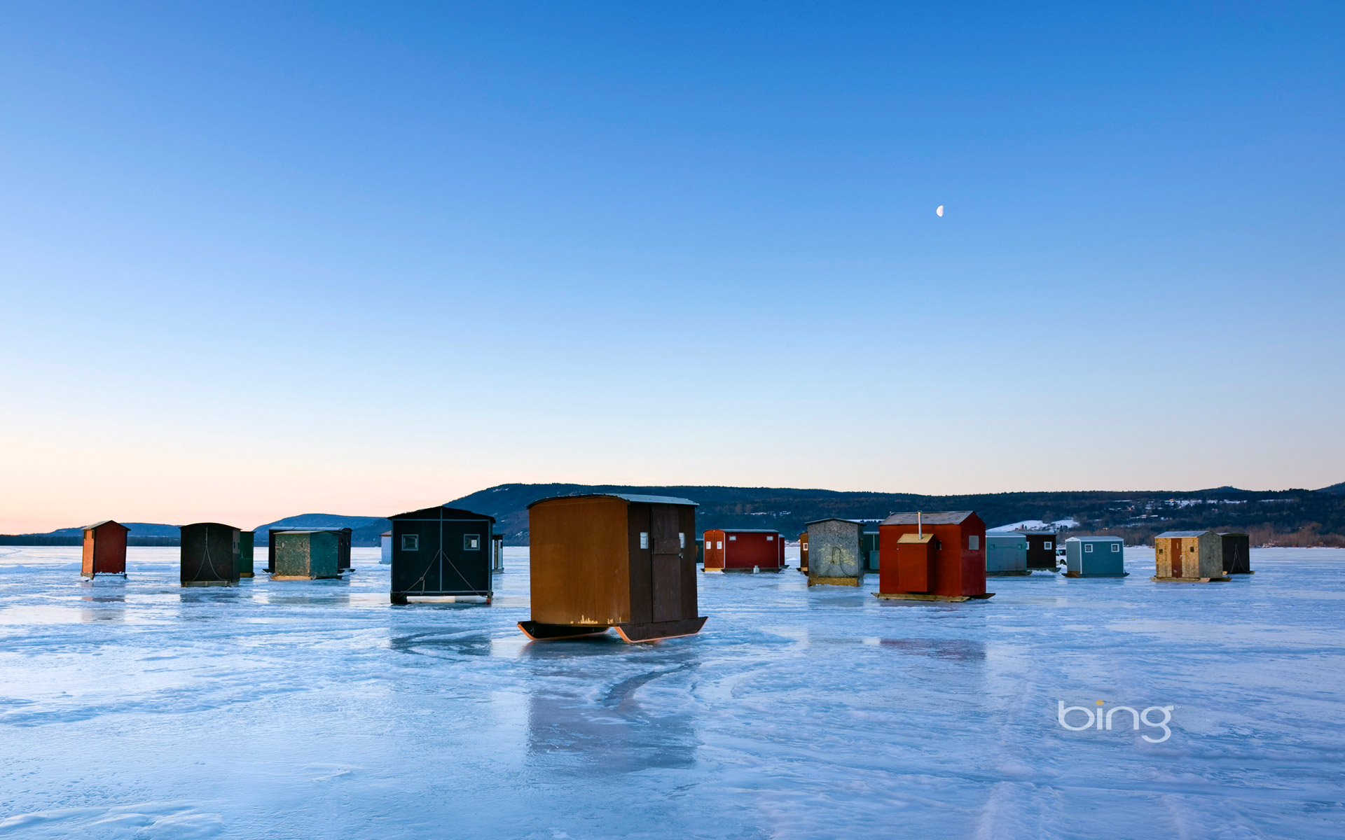 Ice Fishing Huts On Frozen Lake In New York State Usa