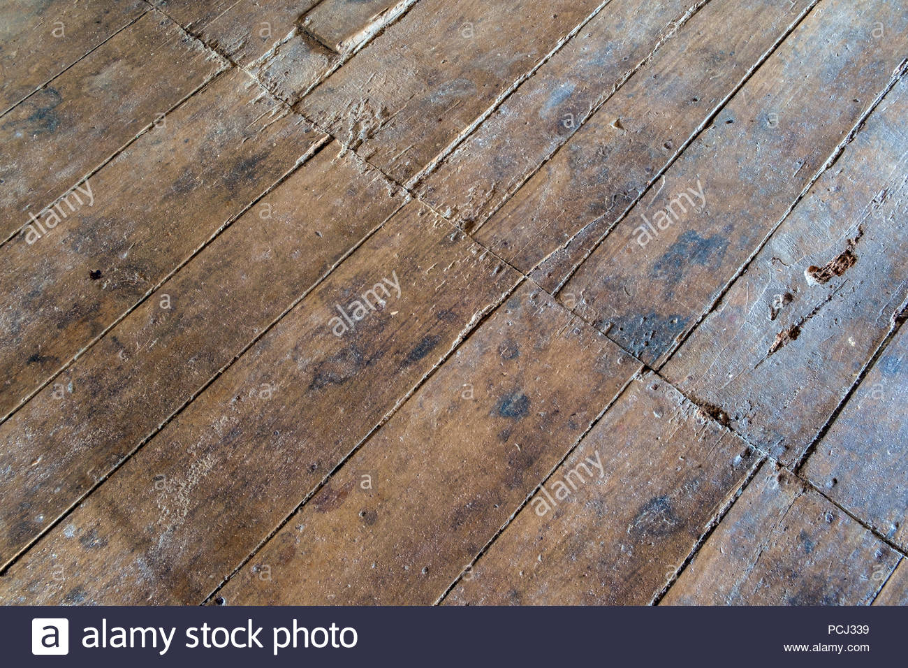 Massive old French farmhouse wooden floor boards after restoration 1300x956