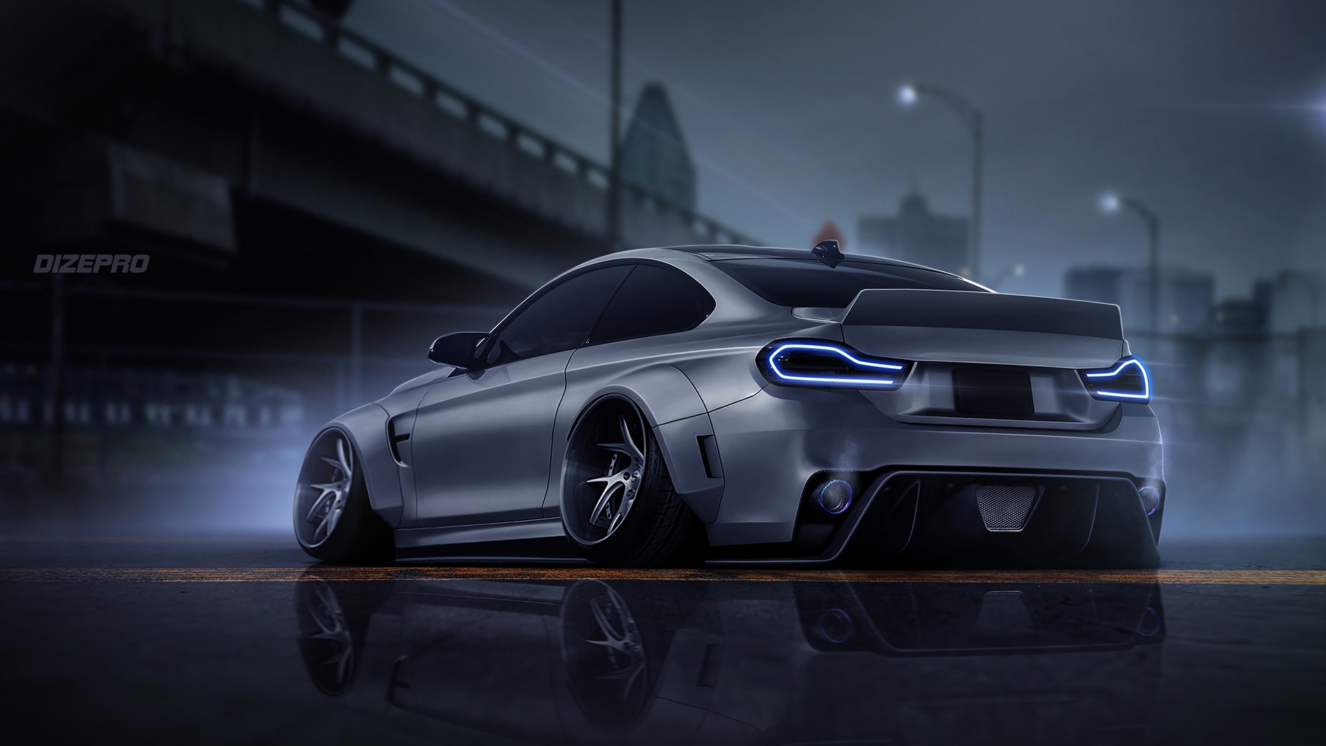 A sleek, silver BMW sports car parked on a rain-slicked city street at night. The car's taillights glow brightly, reflecting in the wet pavement. The city skyline is visible in the background, blurred by the atmospheric conditions