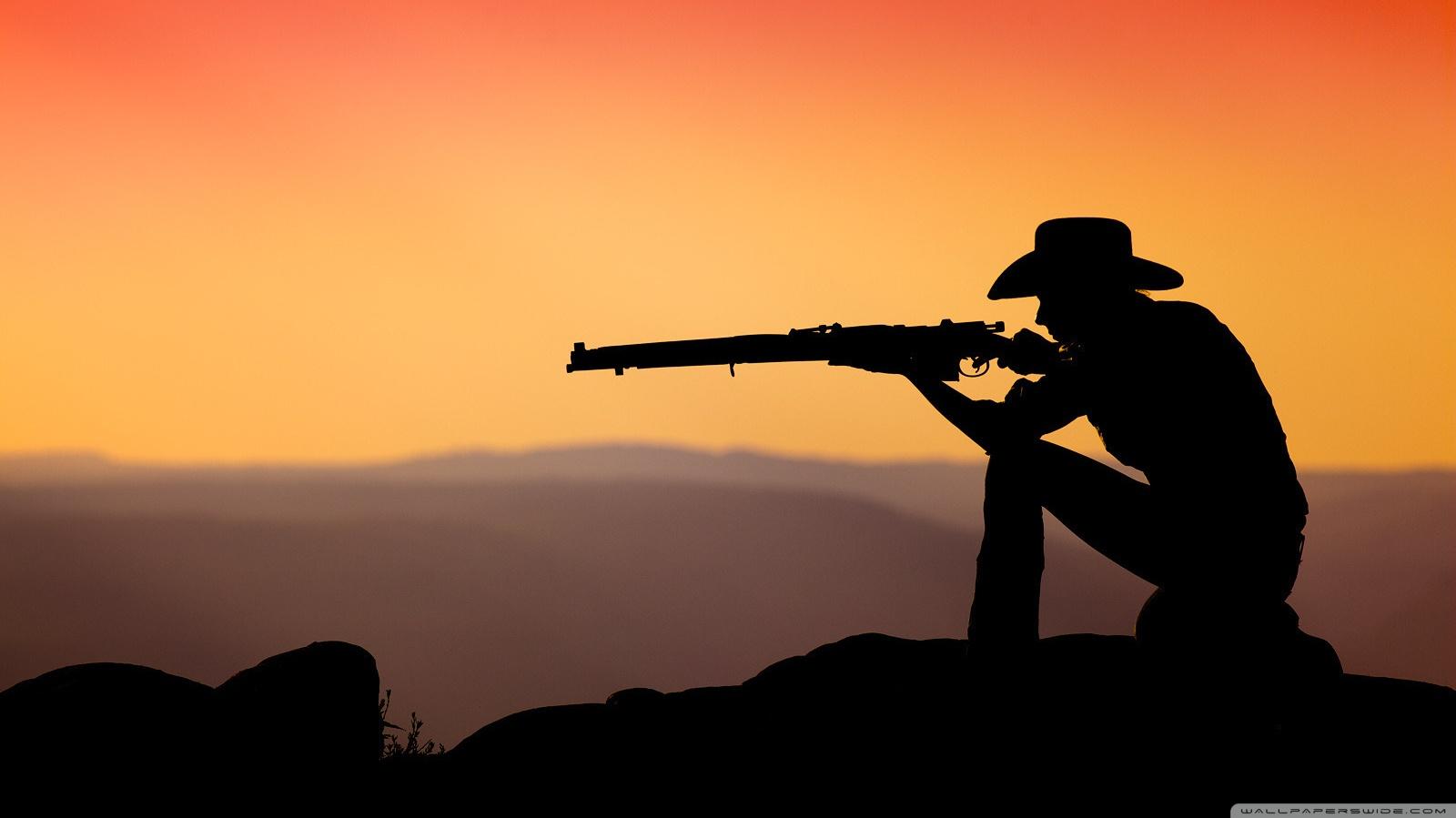 Cowboy Shooting In The Sunset Ultra HD Desktop Background