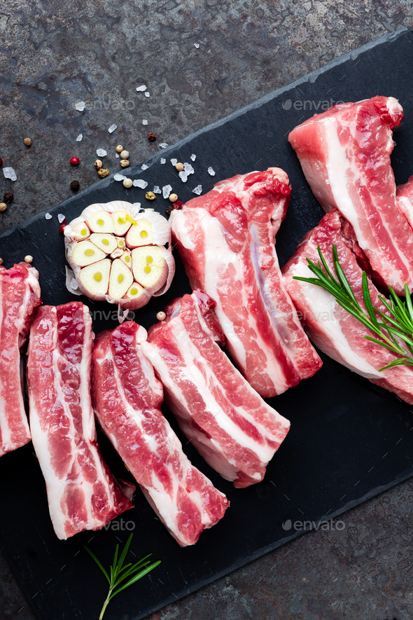 Raw Uncooked Pork Ribs Fresh Meat On Dark Metal Background Top