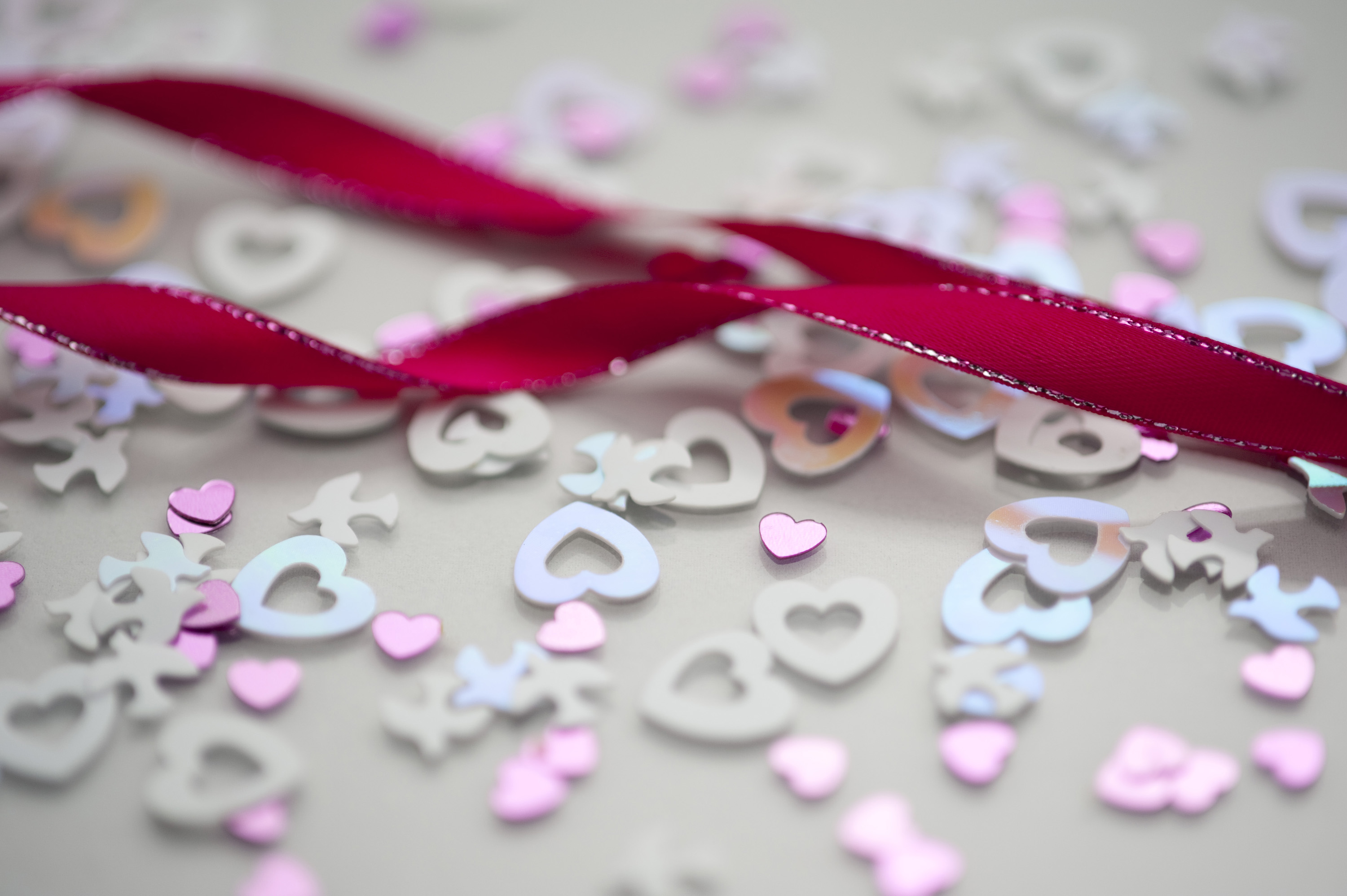 Stock Photo Pink Ribbon And Wedding Confetti Imagelive