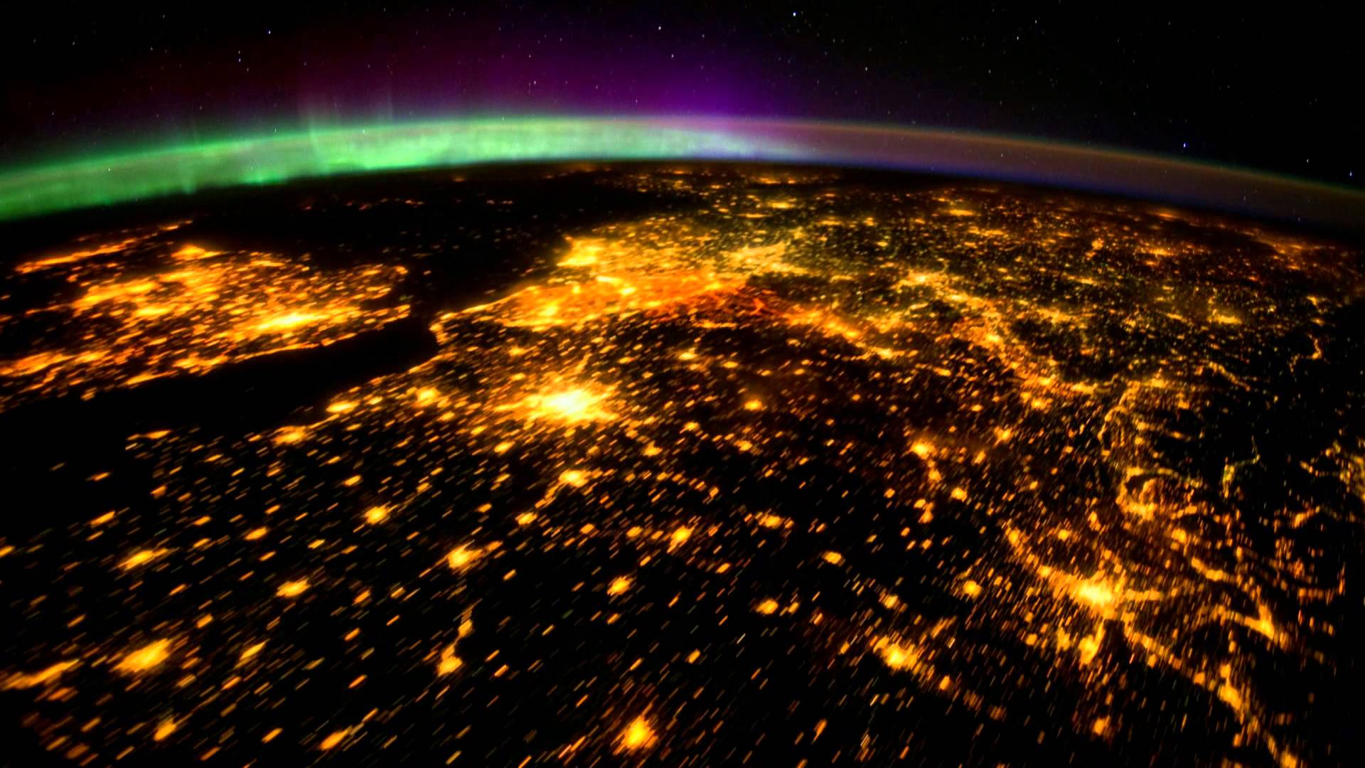 Planet Earth seen from Space ISS mainly at night with aurora