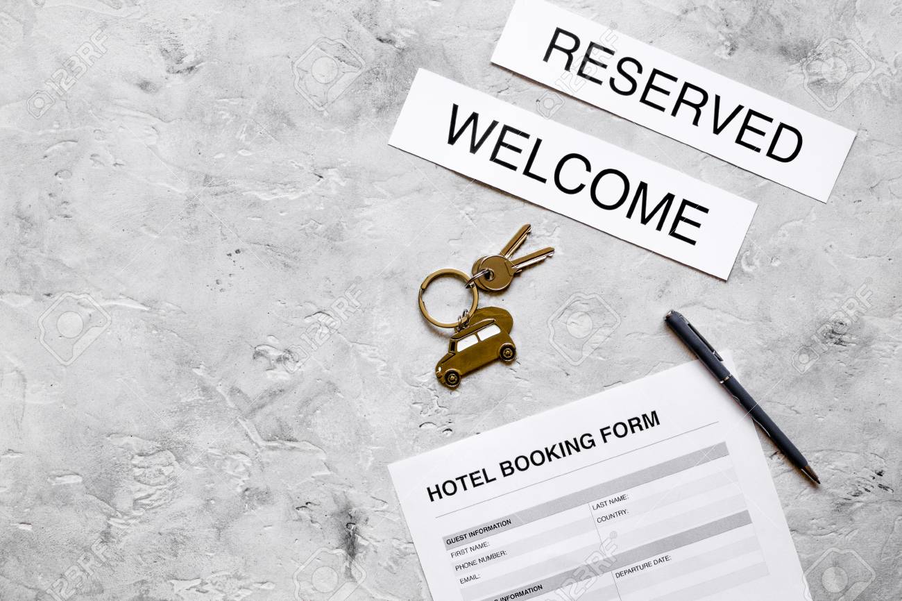 Hotel Reservation Blank And Keys On Stone Background Top