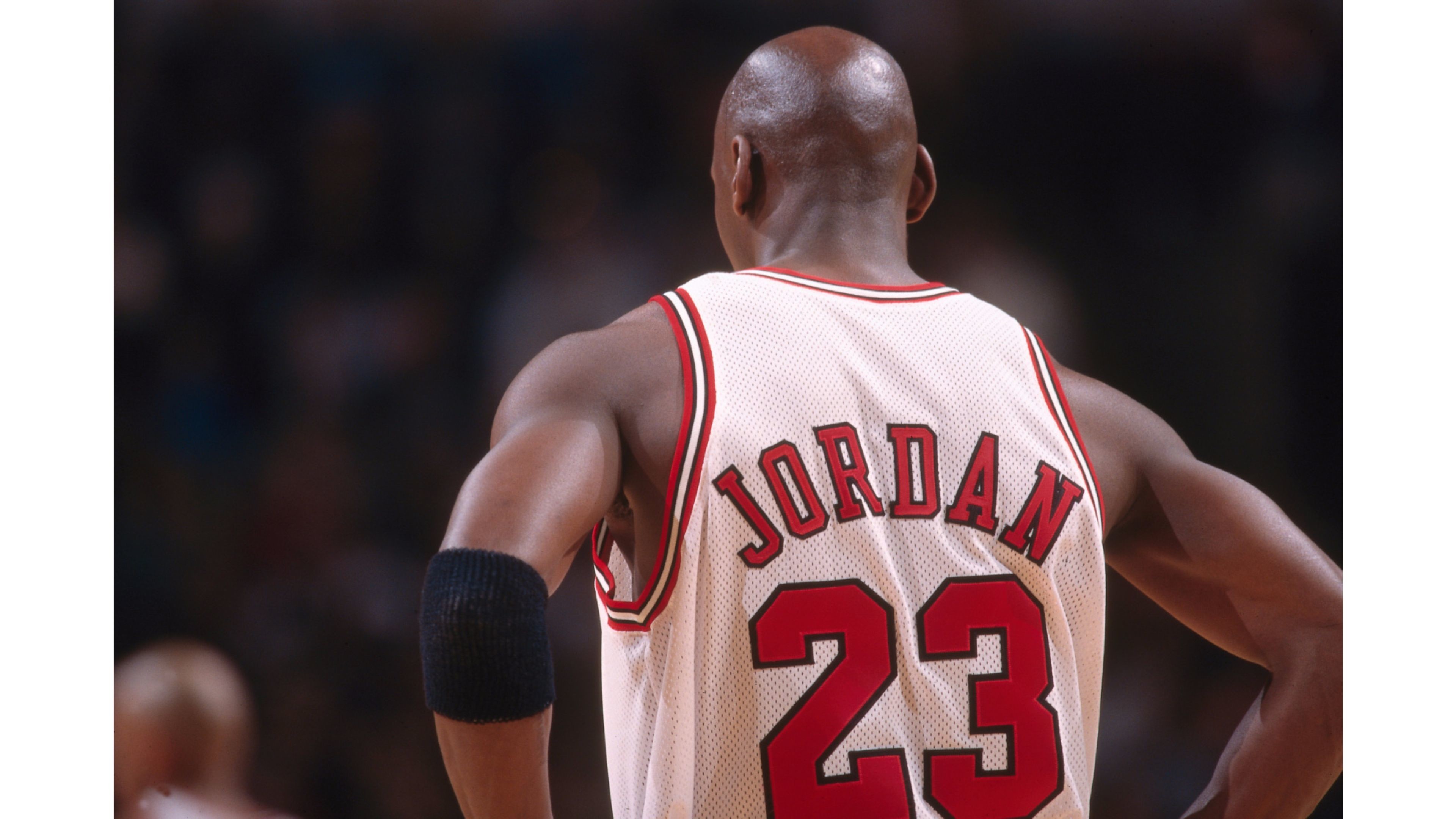 Michael Jordan, number 23 of the Chicago Bulls, seen from the back during a basketball game