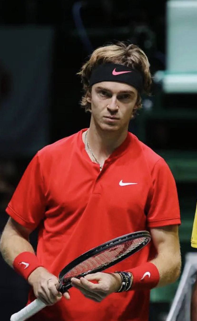 Andrey Rublev Holding A Tennis Racket 4ls3k51lu0yo5qd9 Wallpaper