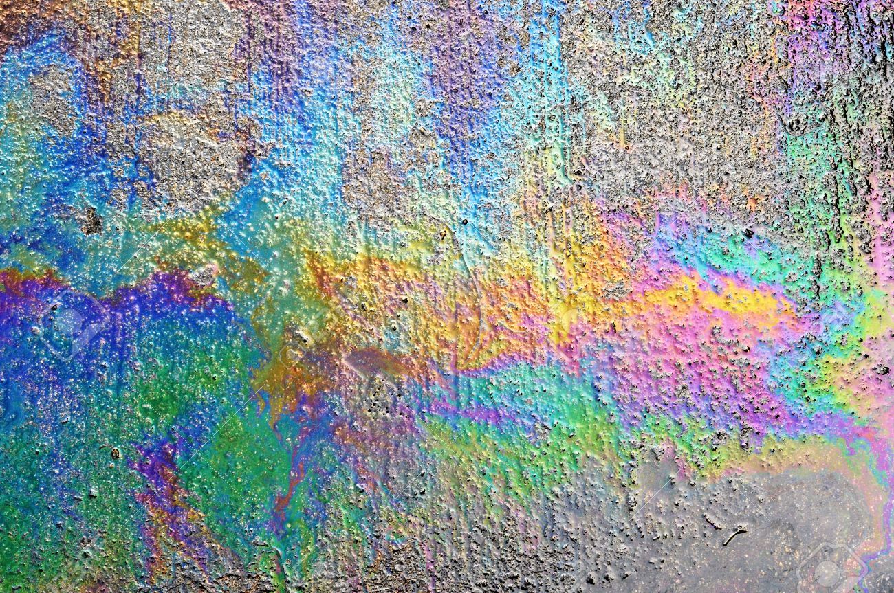 Oil Spill On Asphalt Road Background Or Texture Stock Photo