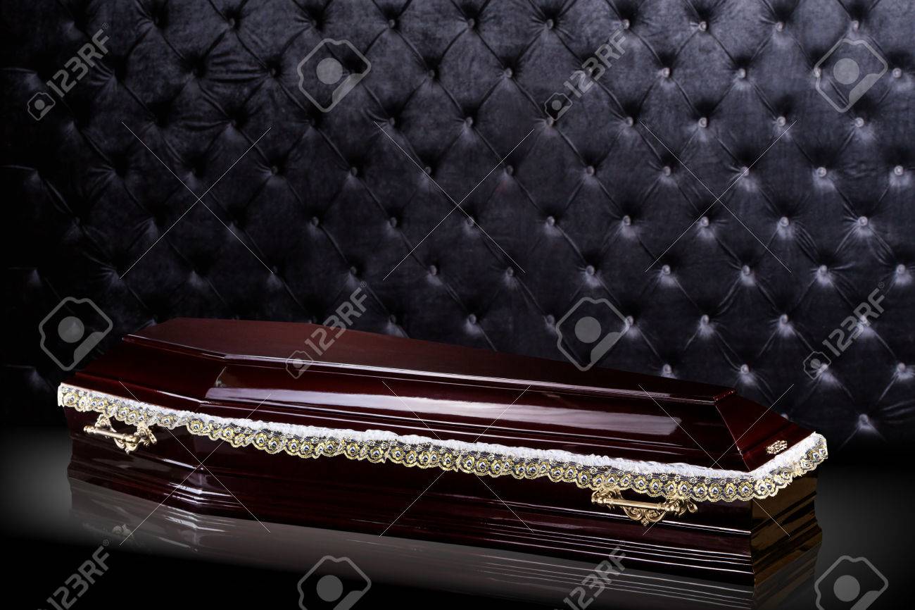 Closed Wooden Dark Brown Coffin Isolated On Gray Luxury Background