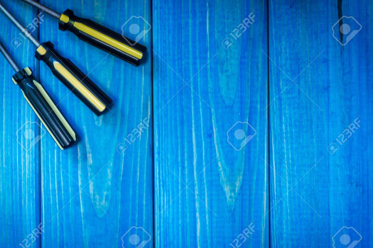 Hand Tool On Blue Wooden Background For Homework Kit
