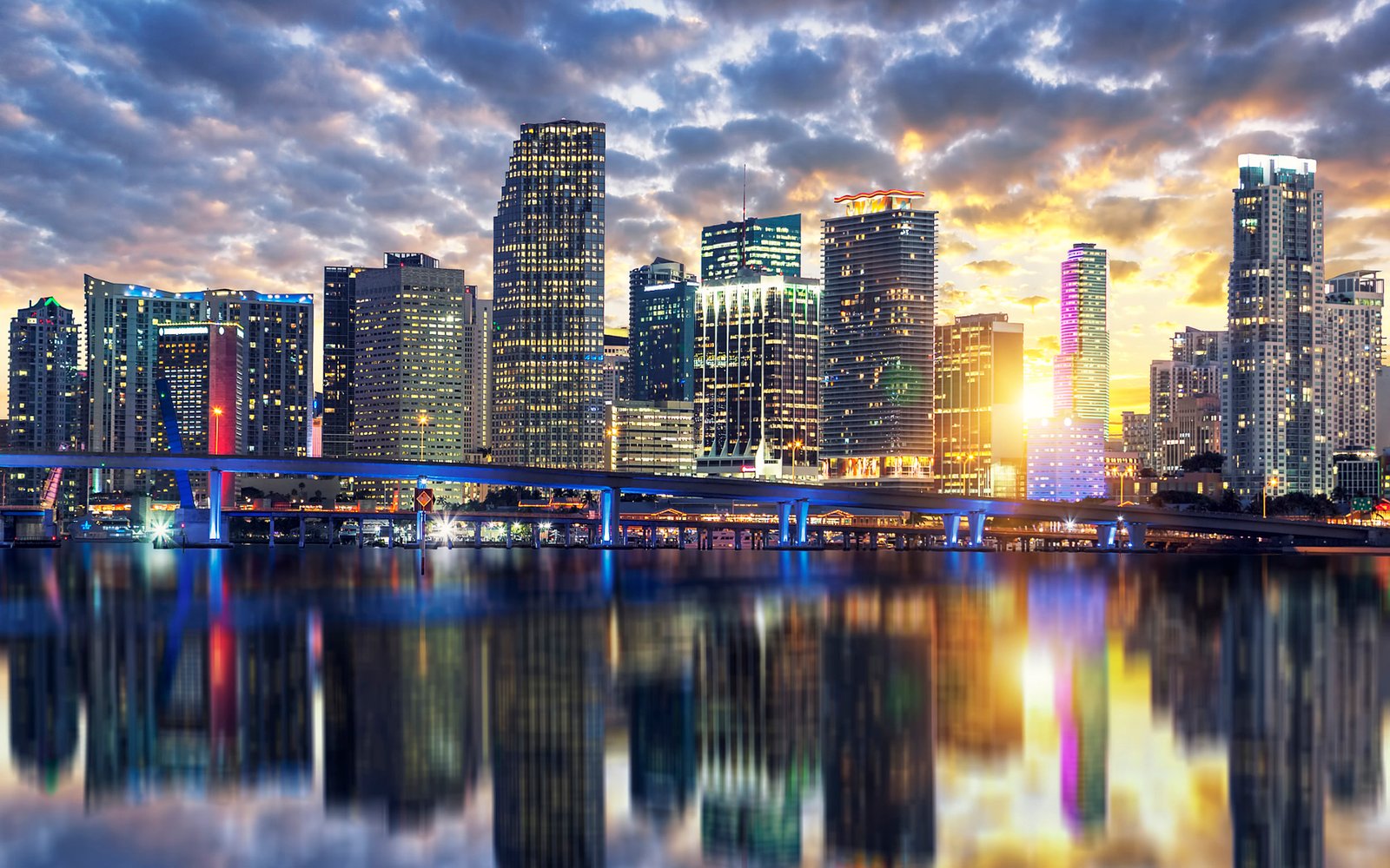 Stunning sunset view of the Miami skyline and its reflection in the water