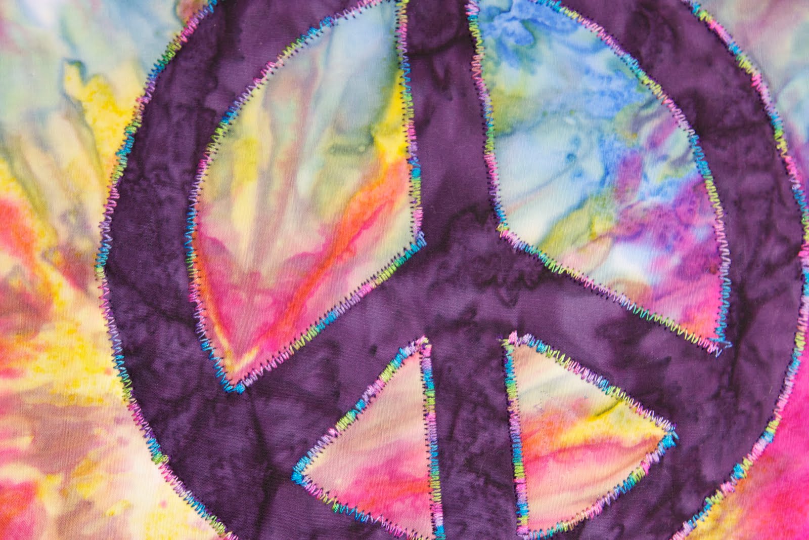 tried some new techniques the peace sign is reverse applique and I