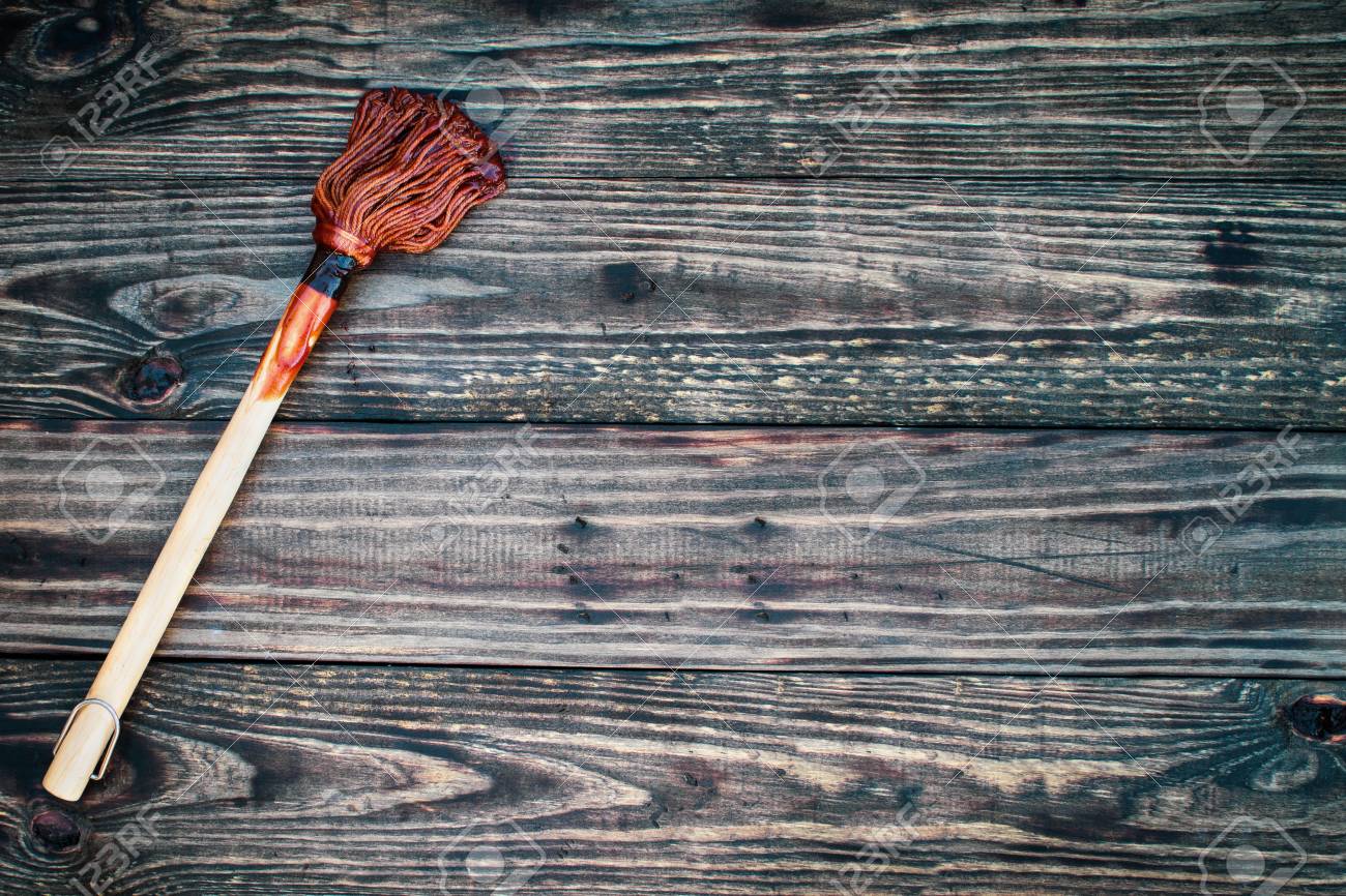 Bbq Mop Or Brush Over Top A Rustic Wood Table Background With