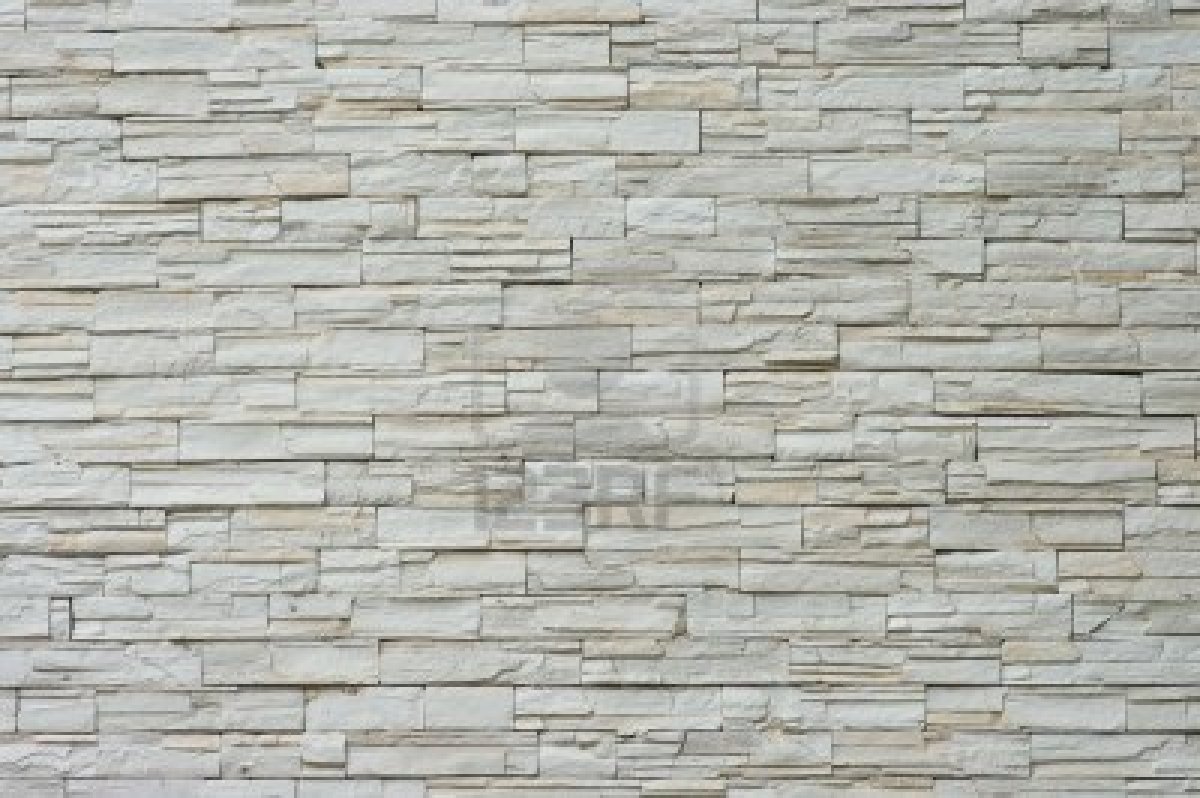 Decorative Wall With Stone Tiles Texture Background Royalty