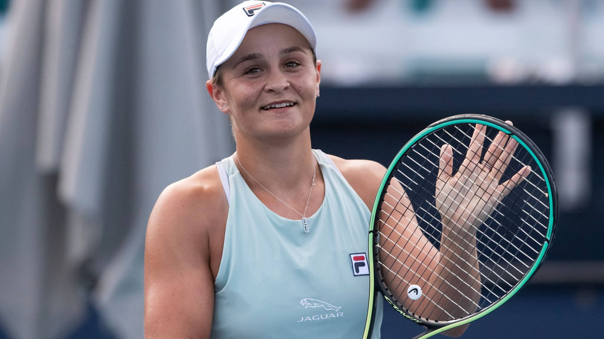 Champion Ashleigh Barty In Action Wallpaper
