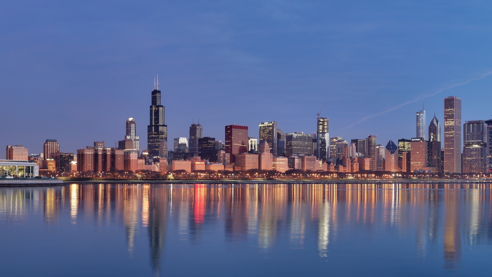 Chicago skyline at dusk with reflections in Lake Michigan