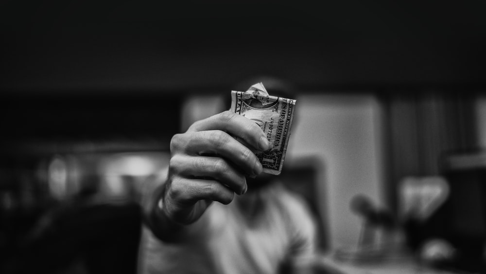 Man Holding Us Dollar Banknote Photo Grey Image