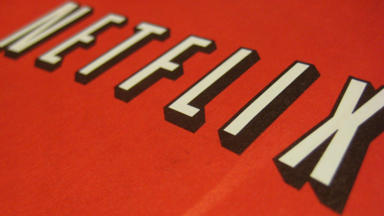 Close-up of the Netflix logo on a red background