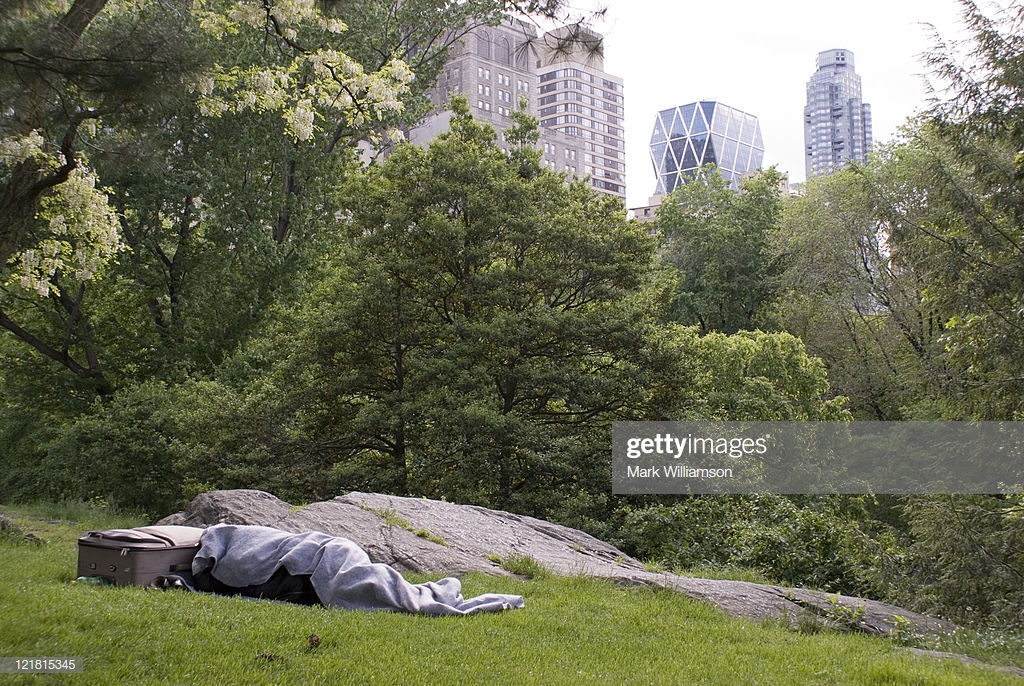 Homeless Person In South Central Park With Hearst Magazine