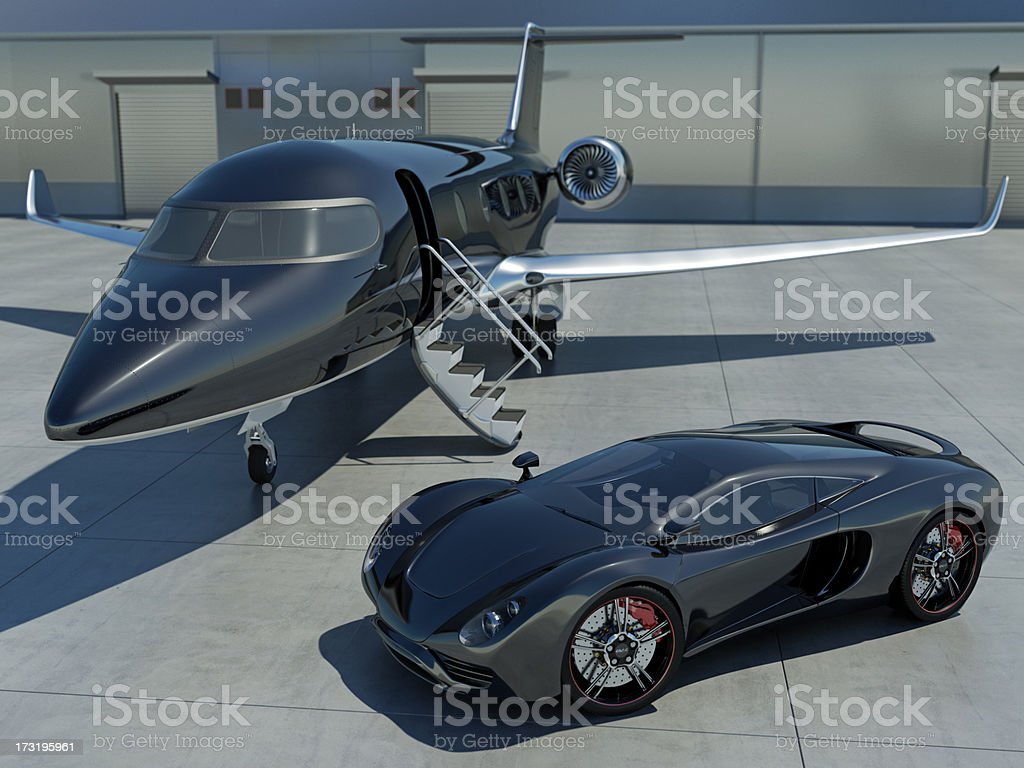 Sleek Black Sports Car And Corporate Jet Stock Photo