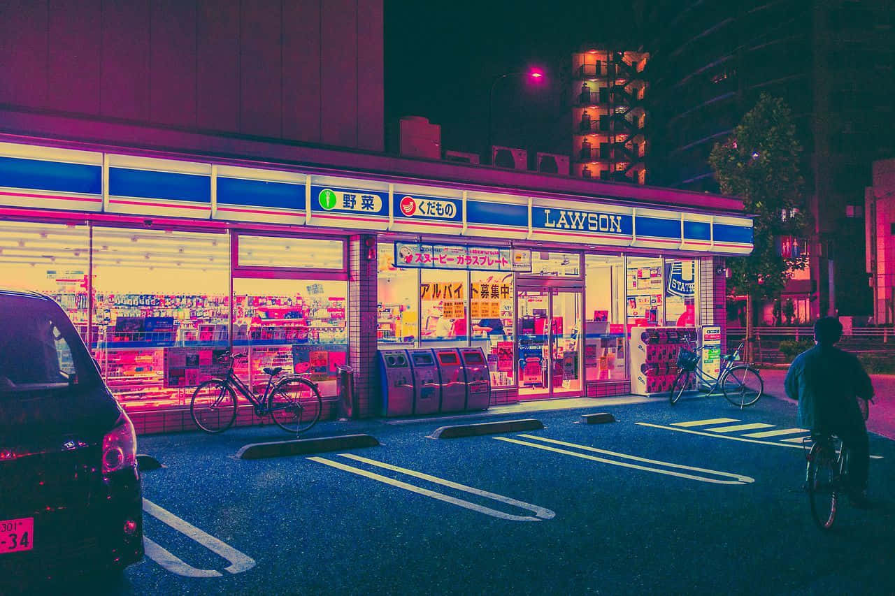 A Stunning Of City Being Lit Up By Japanese Neon Wallpaper