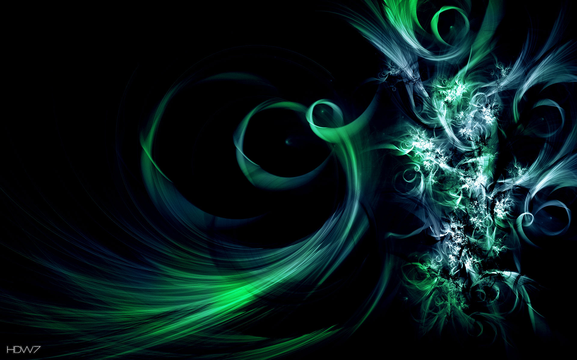 Abstract green and blue swirls on a black background, suitable for a laptop wallpaper