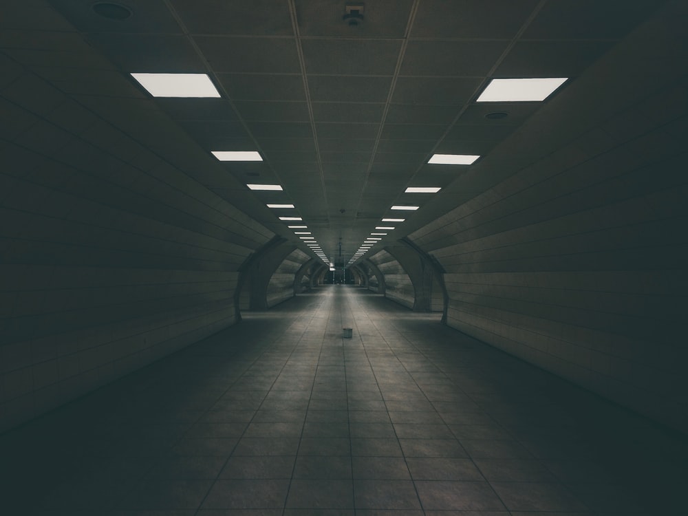 Dark Tunnel Road With Turned On Ceiling Lamps Photo Grey