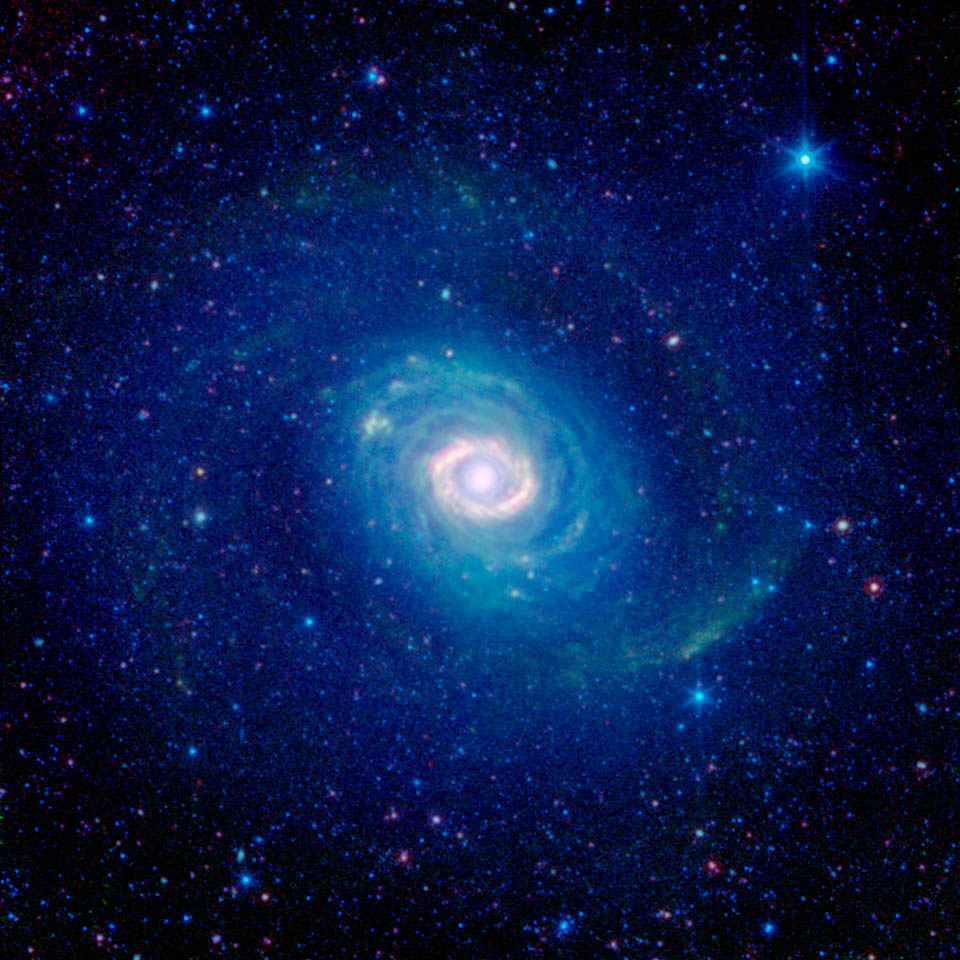 Galactic Wheels within Wheels   NASA Spitzer Space Telescope