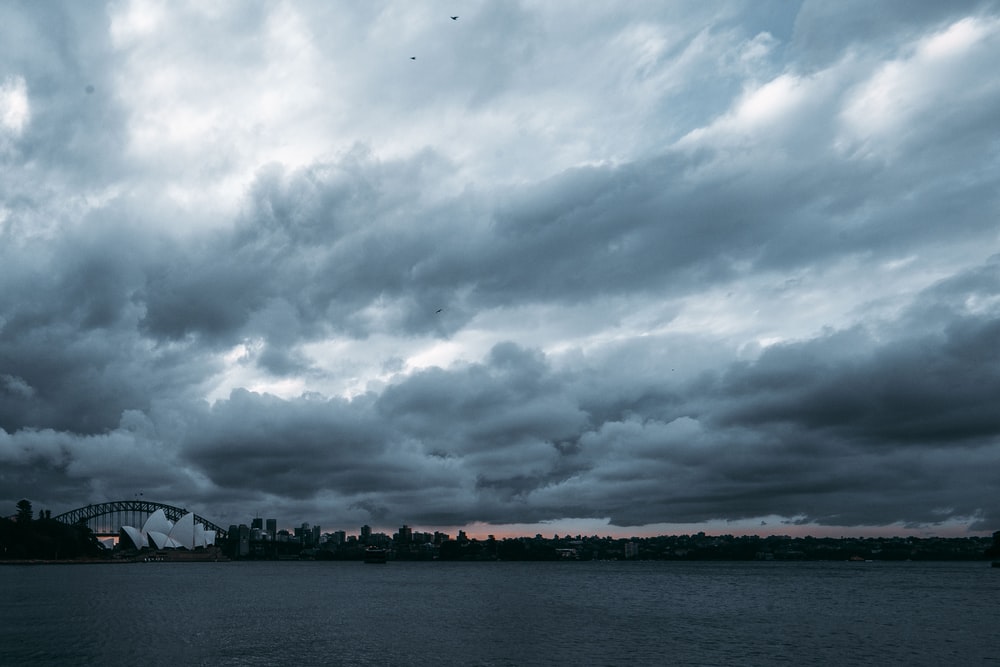 Body Of Water Under Cloudy Sky Photo Sydney Image