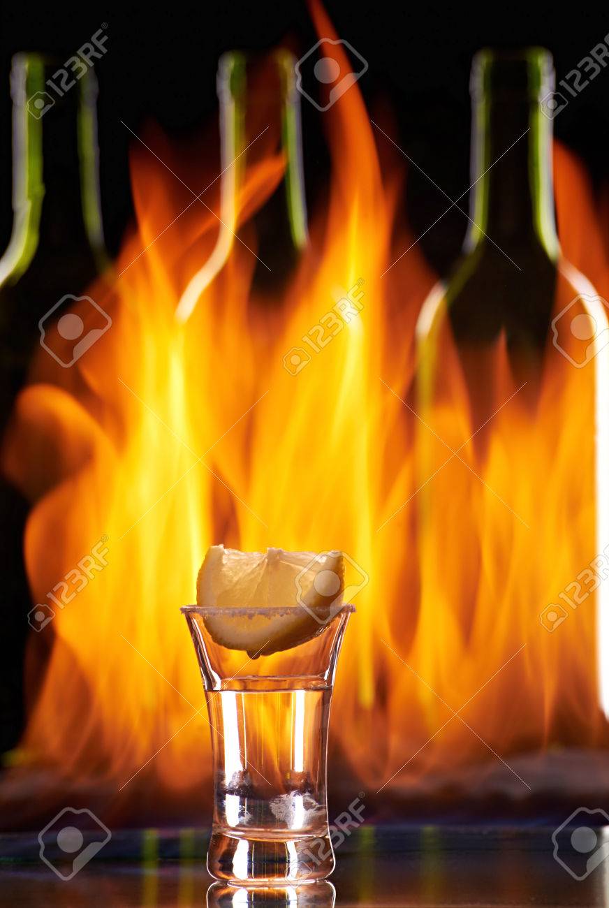 Tequila Shot On Flaming Background Stock Photo Picture And