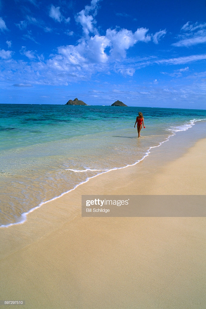 Hawaii Oahu Lanikai Woman Walks Along Shoreline Water Mokulua