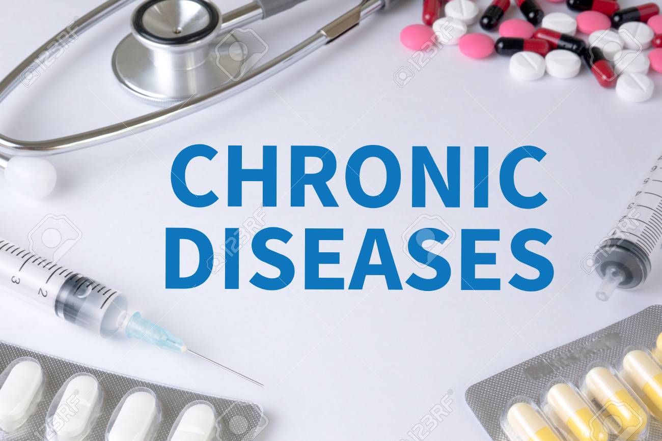 Chronic Diseases Text On Background Of Medicaments Position