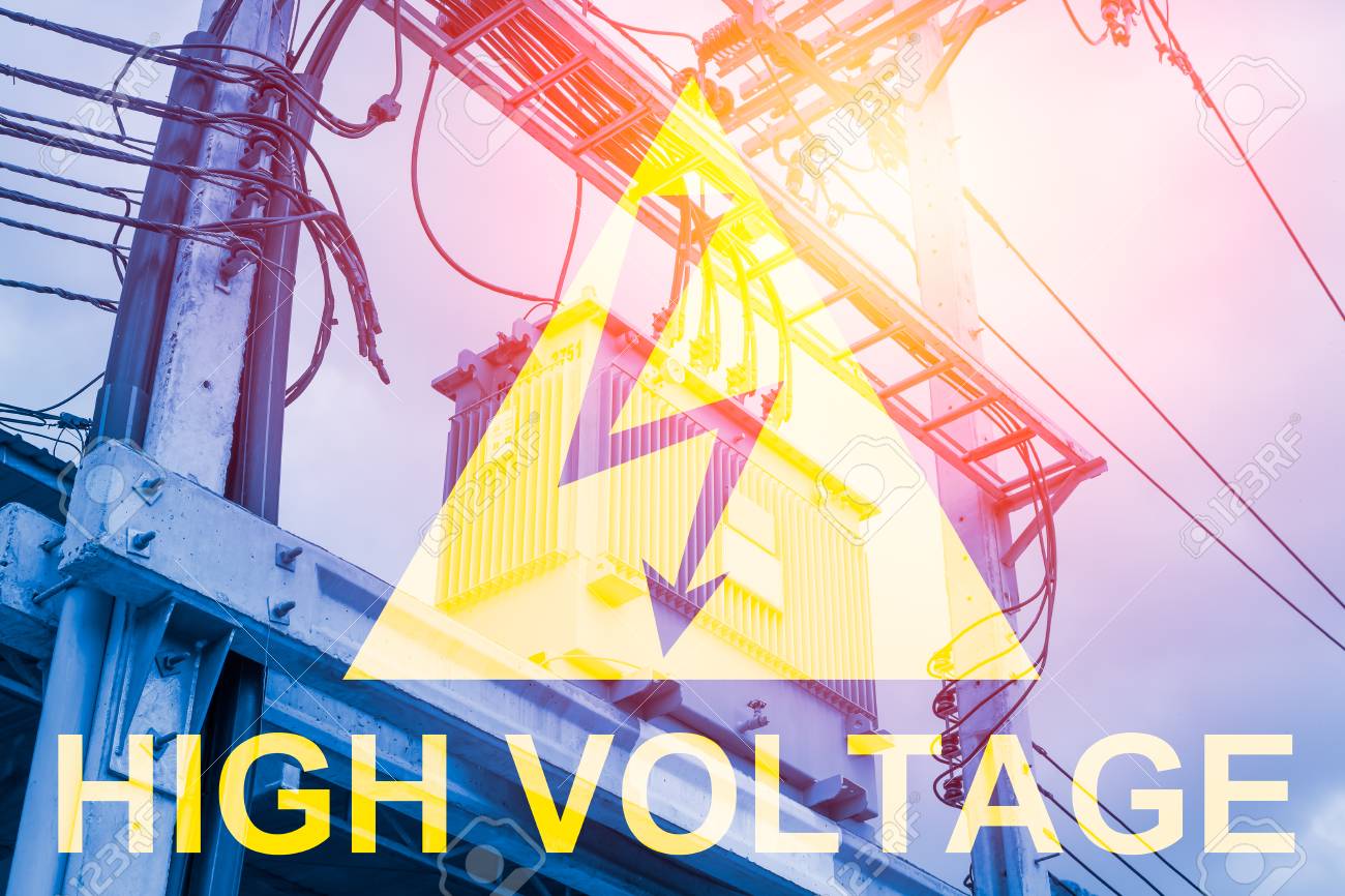 High Voltage Warning Sign With Electric Transformer Background