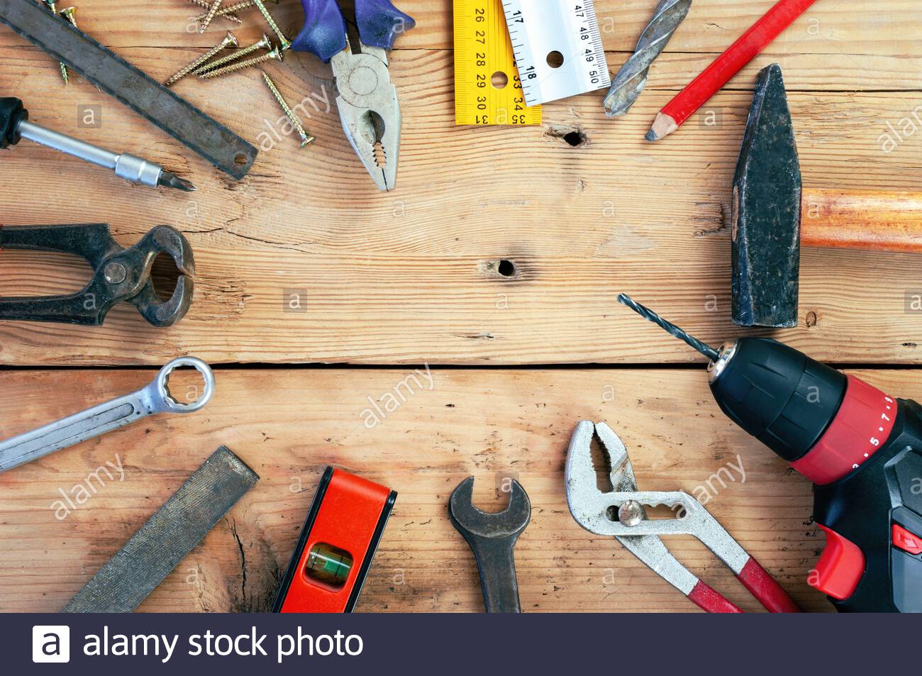 Set Of Hand Tools On Wooden Background Stock Photo