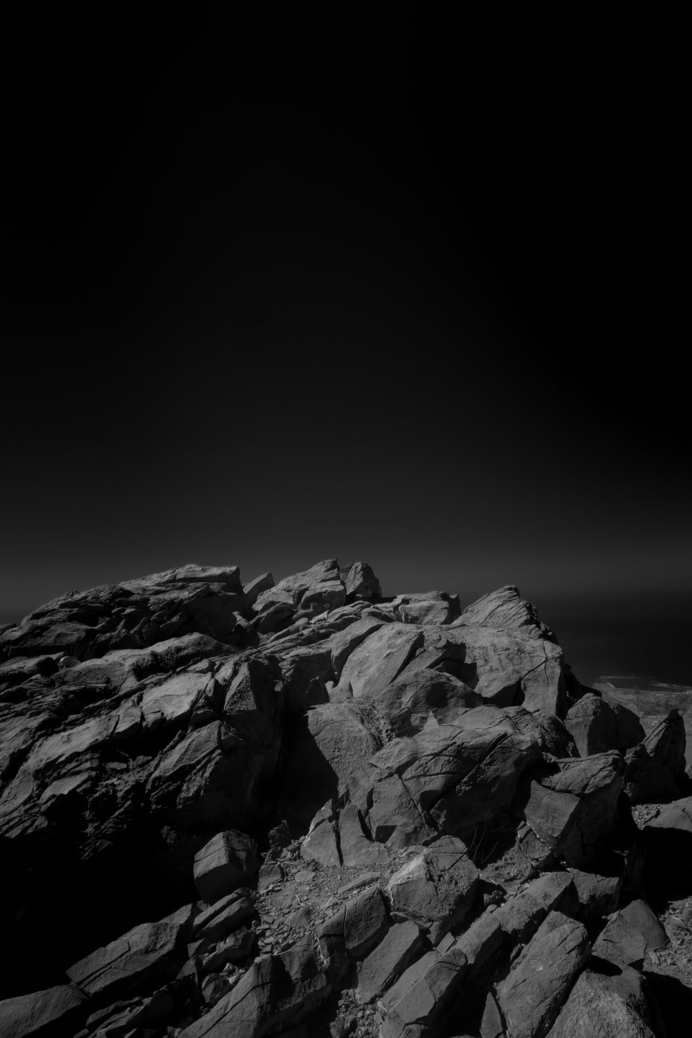 gray scale photo of rocky mountain photo Black Image on 1000x1500