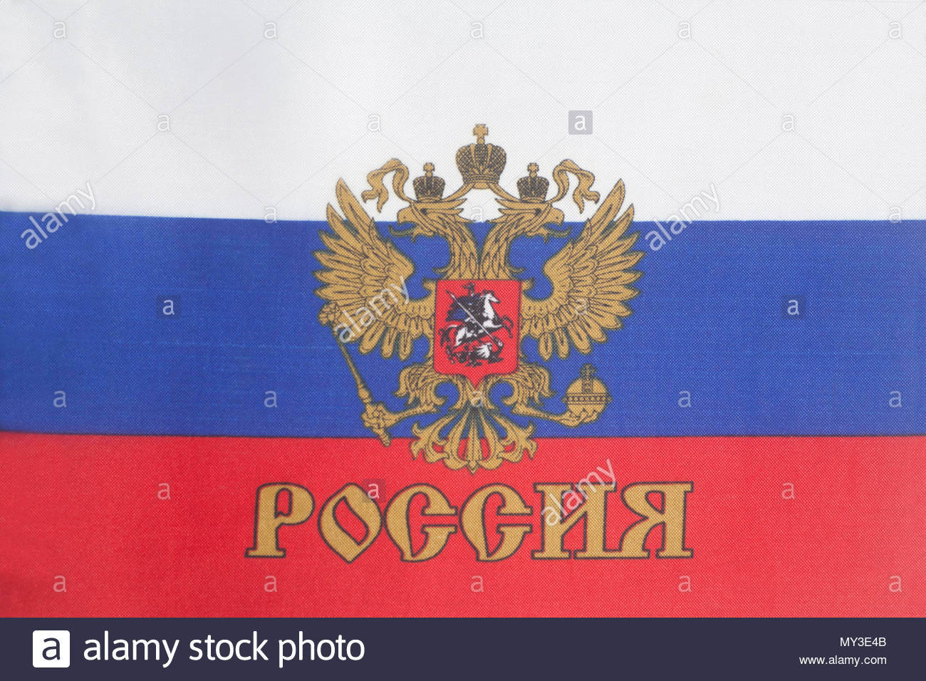 Russian flag with emblem of Russia background close up Stock Photo