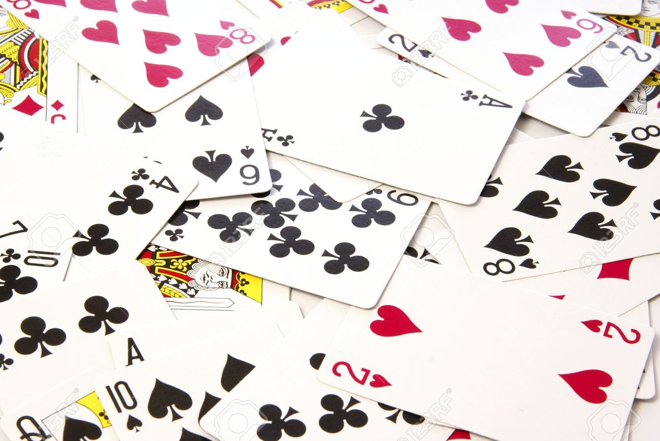 Scattered Deck Of Playing Cards For Use As Design Background Stock
