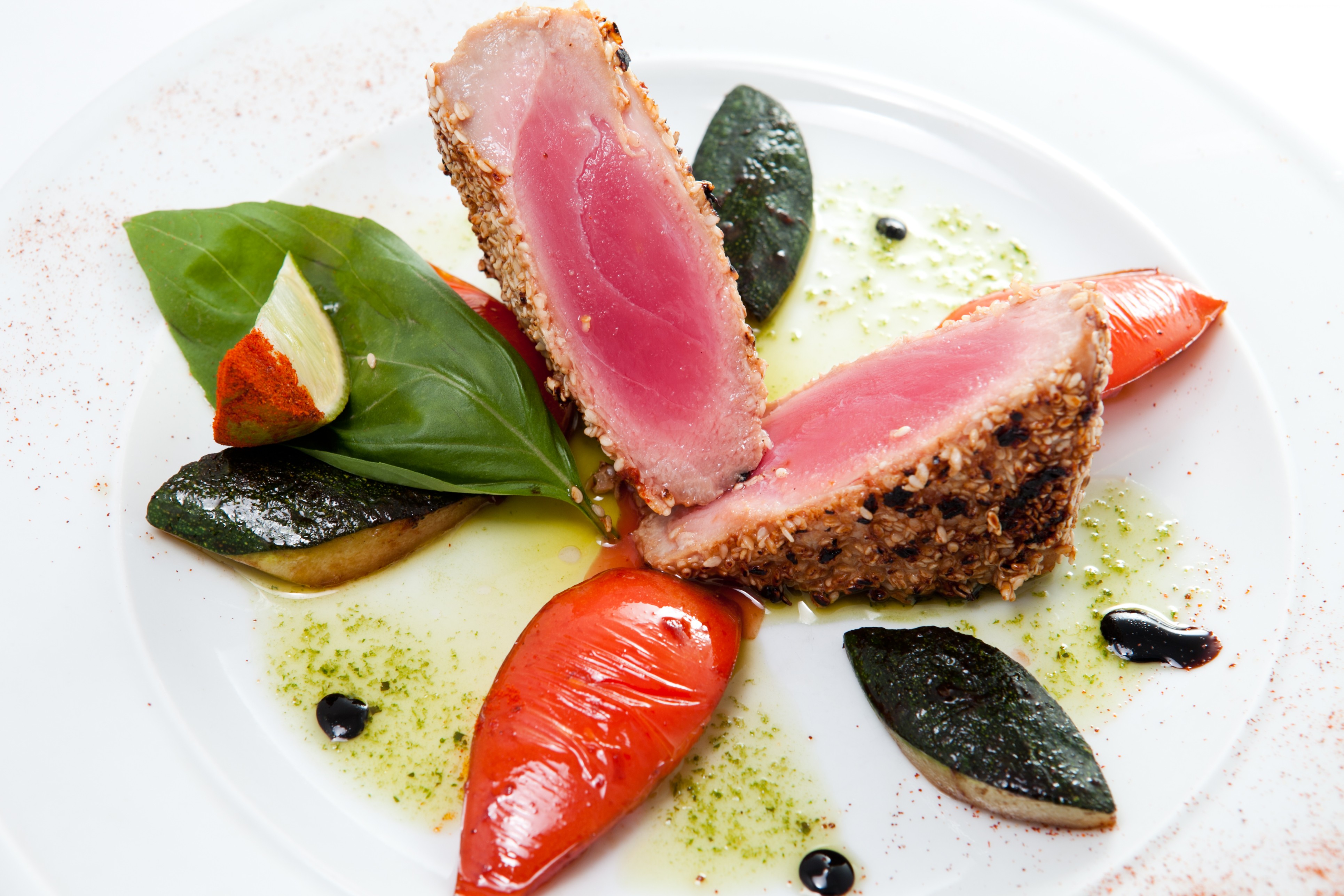 Appetizing Tuna Steak With Vegetables On A White Plate